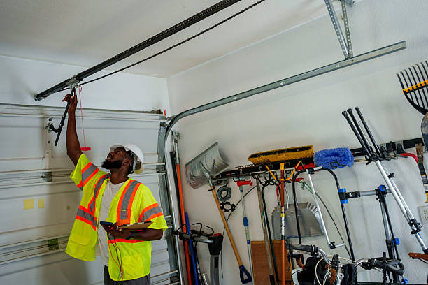 Professional Garage Door Panel Replacement technician working in East Los Angeles, CA